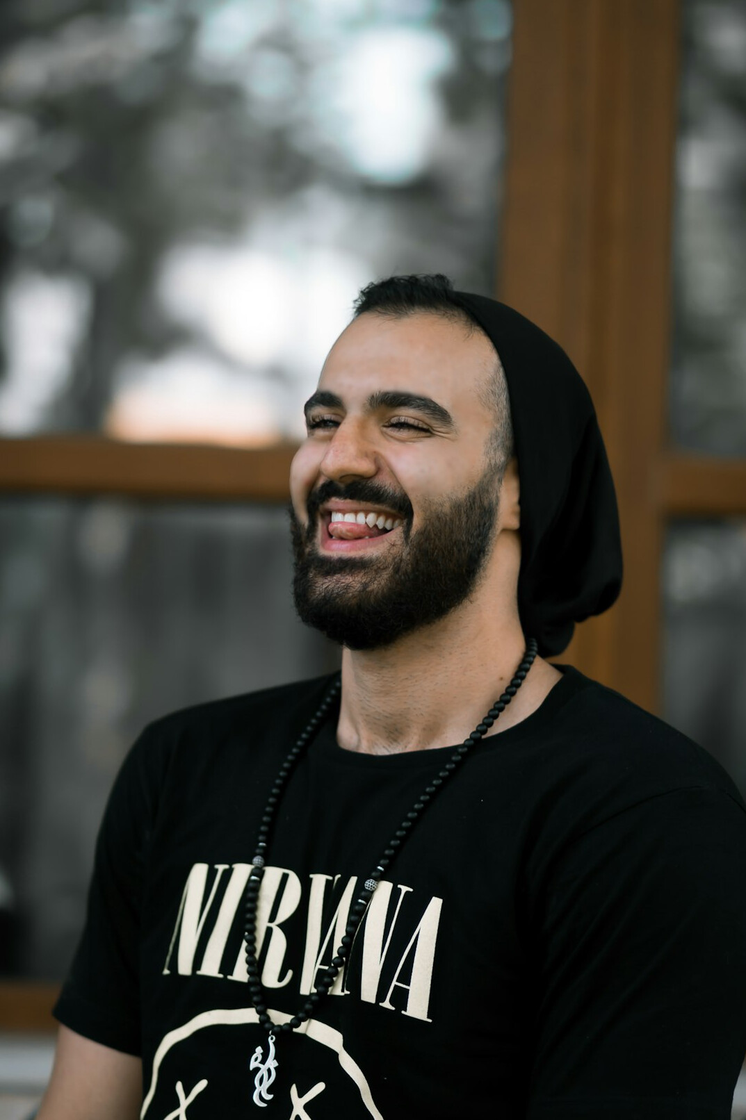 Portrait of a smiling man with a short beard