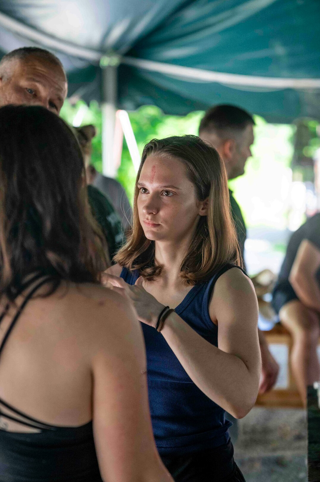 Leader explaining ideas to a team around a table